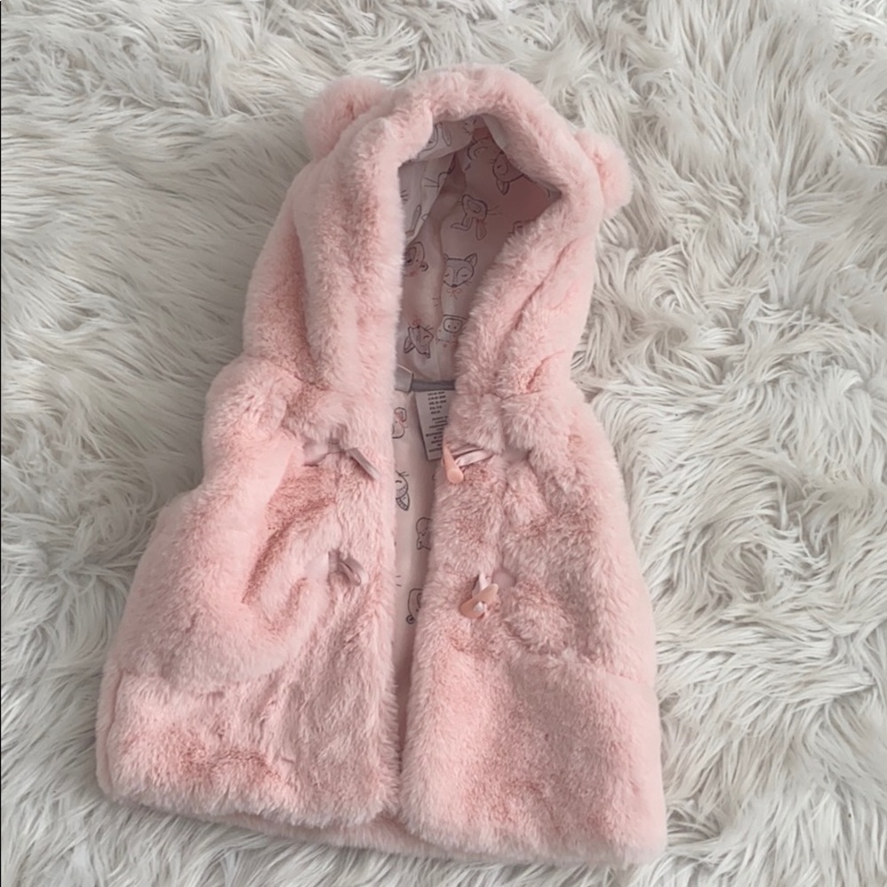 Light pink faux fur vest